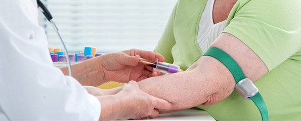 Woman Arm Drawing Blood Test 595x240 595x240